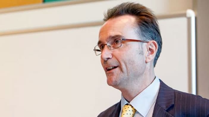 Portrait of Simon Deakin